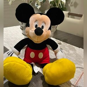 Disney Mickey Mouse Plush stuff with Red and Yellow Accents. 
Soft and cuddly